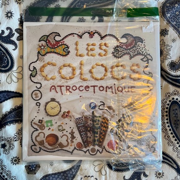 Brand new in plastic vinyl record - Les Colocs, Atrocetomique - Picture 1 of 2